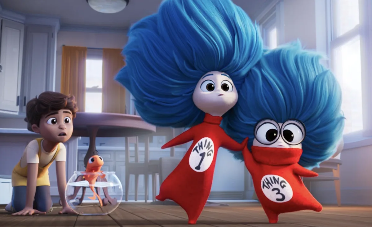 Two blue-haired characters in red outfits stand beside a boy and a goldfish in a bowl.